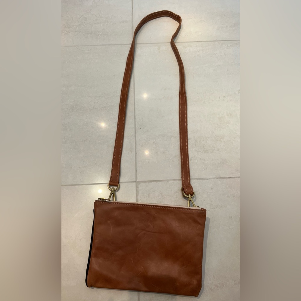 Gently used double sided leather purse.